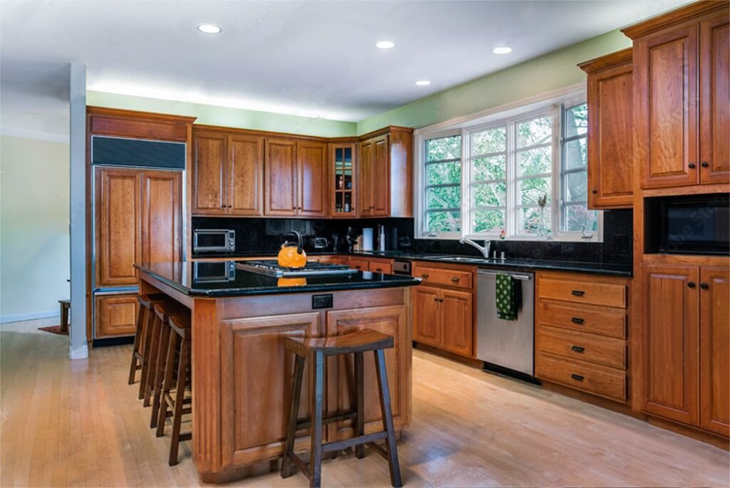Classic wooden kitchen with island.
