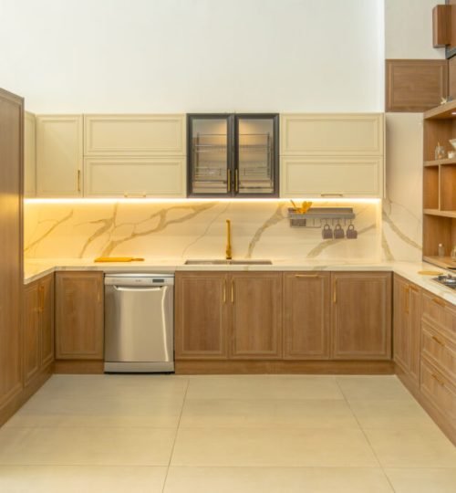 Modern kitchen with wooden cabinetry.